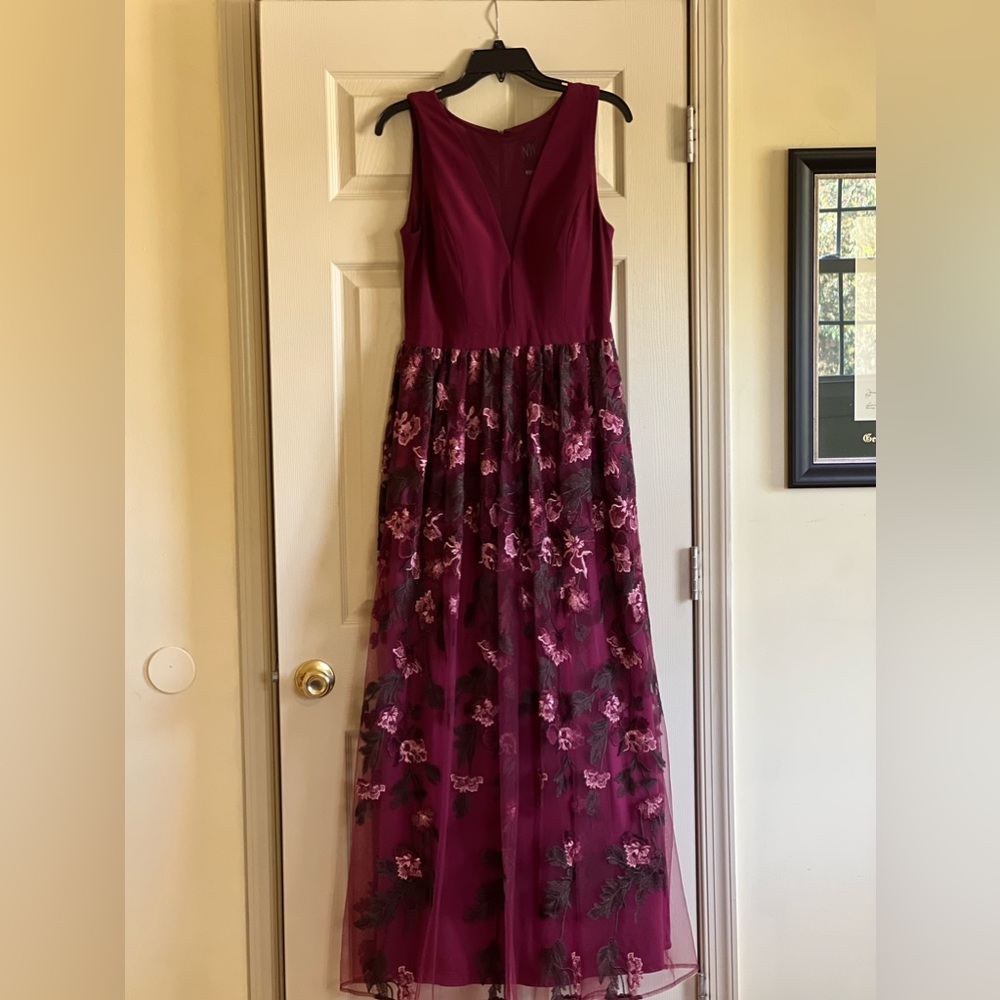 Elegant burgundy NW gown with flowered lace overlay